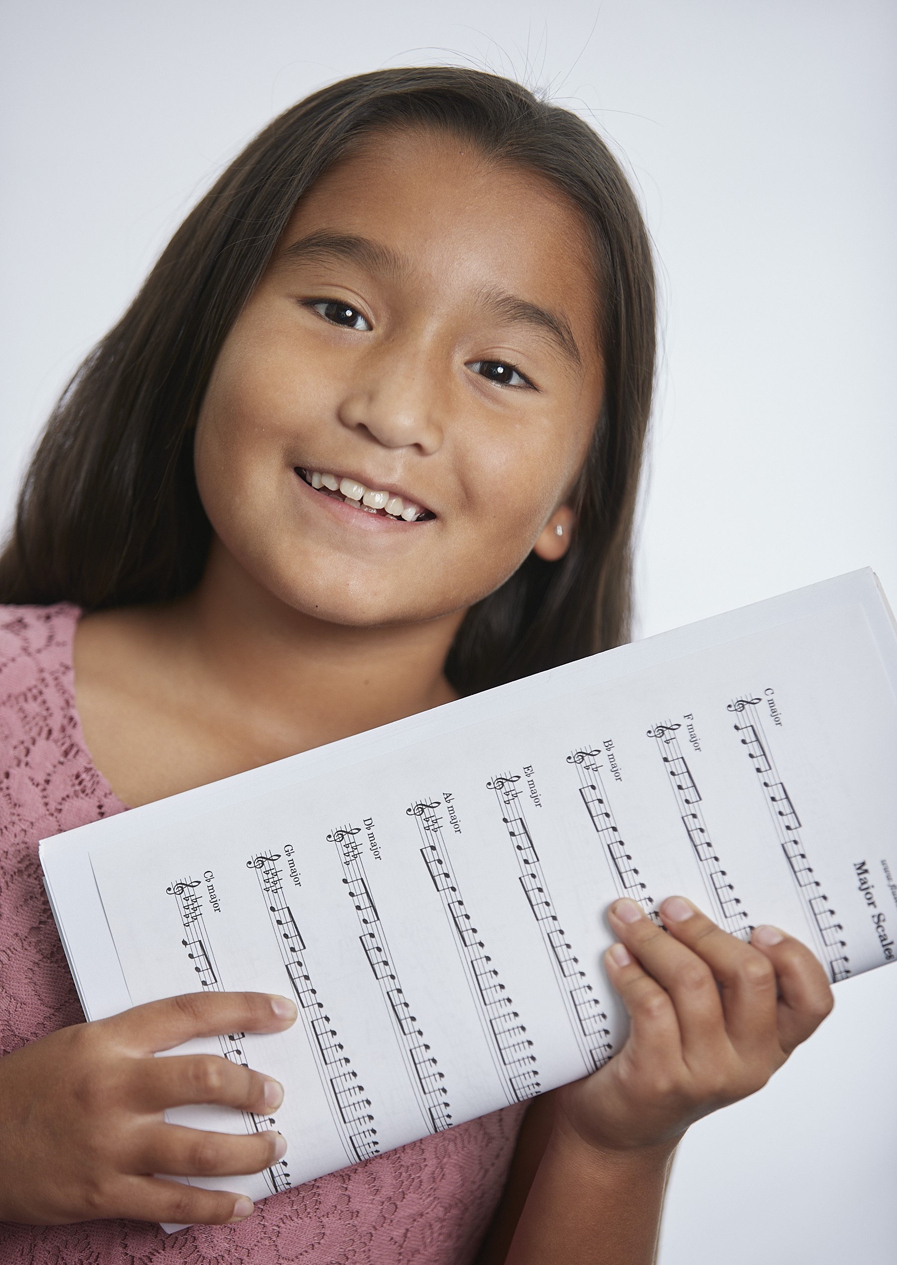 Student Holding Music